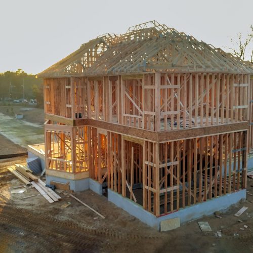 New house under construction exterior framing joist and beam